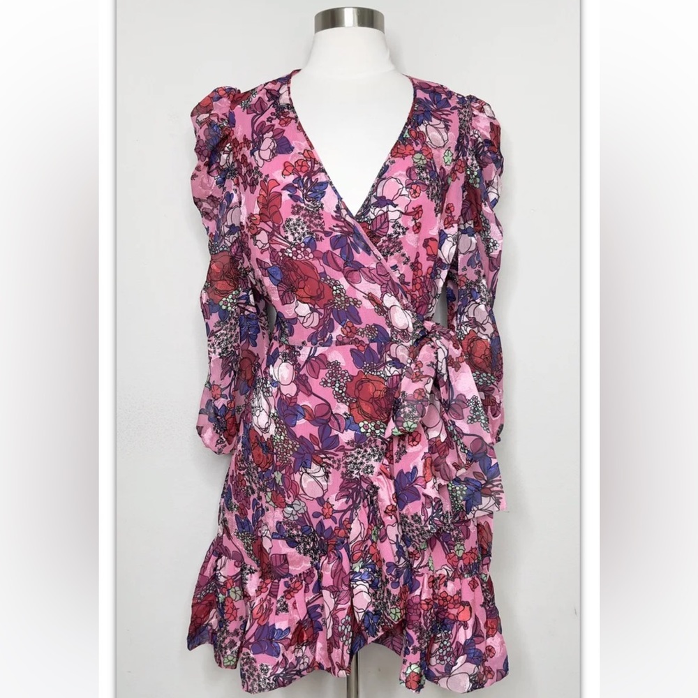 Tanya Taylor, Vibrant florals on this wrap dress with Victorian flair sleeves.